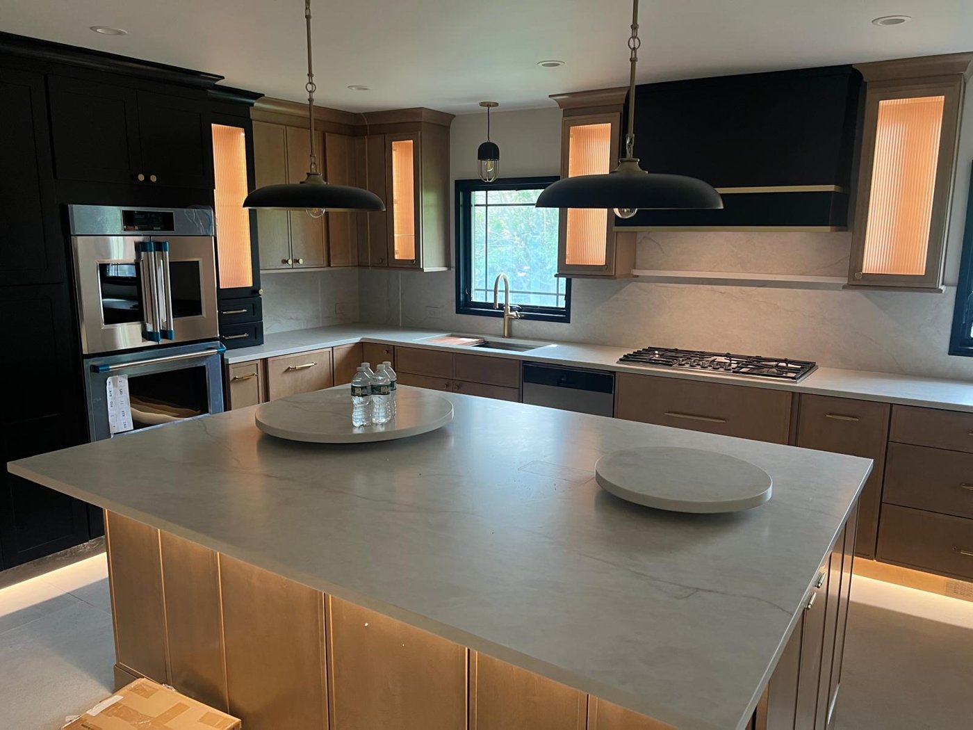 Completed black and natural oak kitchen with island Bergen County NJ Bergen Remodeling