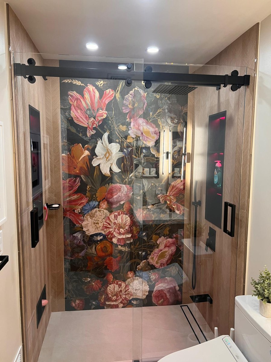 Completed frameless glass shower with floral feature wall Bergen County NJ Bergen Remodeling