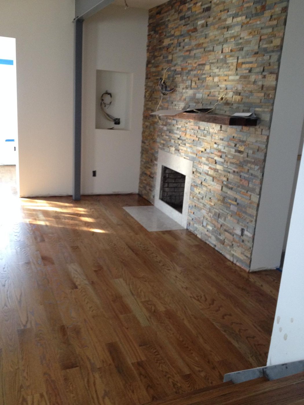 Ledger stone fireplace feature wall custom home Bergen County NJ Bergen Remodeling